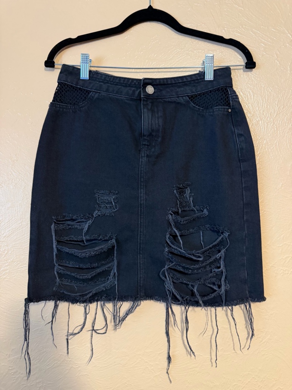 Distressed Black Denim Mini Skirt with Frayed Hem